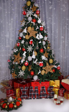 Christmas tree and handmade fabric letters XMAS