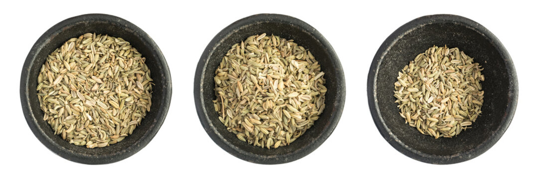 Raw Dry Fennel Seeds Heap in Black Iron Bowl