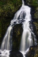 Fototapeta na wymiar Waterfall in rain forest British Columbia Canada