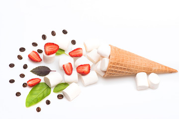 ice cream cone with marshmallow, coffee beans, strawberry and basil