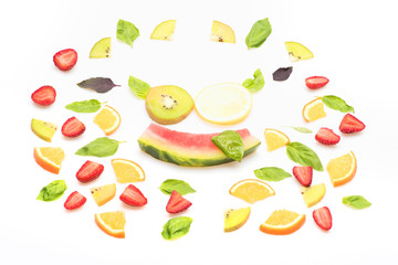 watermelon, strawberry, leaves, kiwi and orange isolated on white
