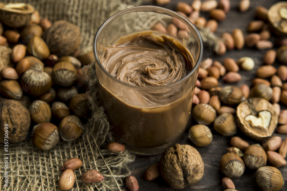 Wall mural nut paste of peanuts, walnuts and hazelnuts with honey