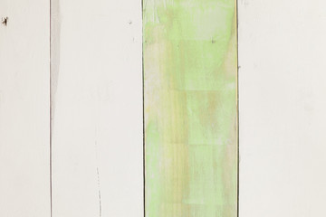 Rustic old plank background in white and green, top view 