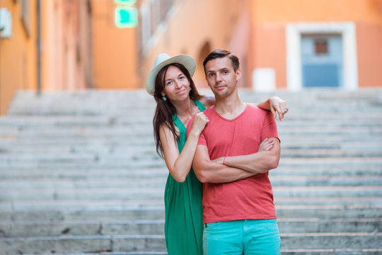 Romantic couple on Steps in Rome enjoy italian holidays.