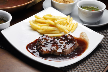 Grilled meat with trimmings