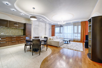 Russia, Moscow region - interior design kitchen - living room in luxury new apartment