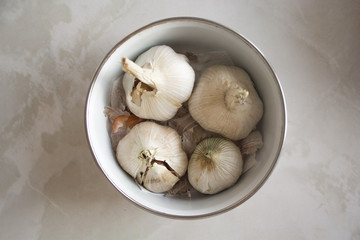 garlic in a metal bowl