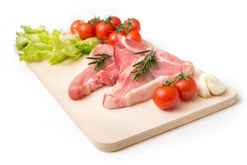 Fresh beef steaks with vegetables