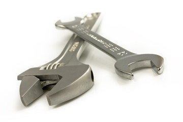 Monkey wrenches isolated on white background. Still-life picture taken in studio with soft-box.