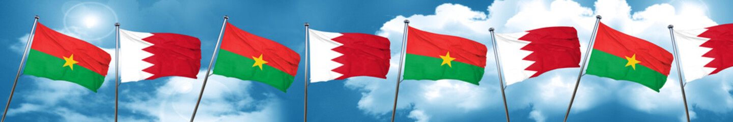 Fototapeta na wymiar Burkina Faso flag with Bahrain flag, 3D rendering