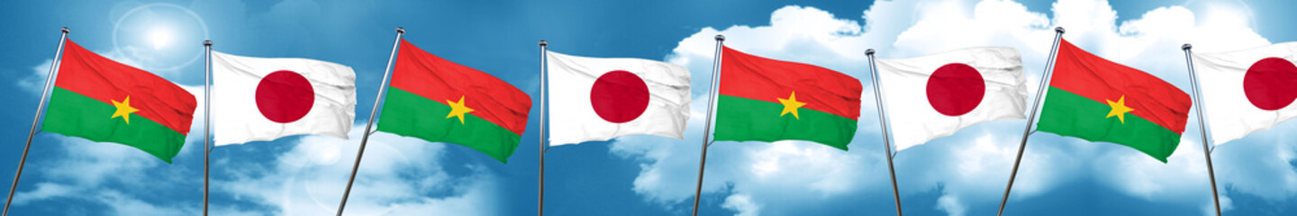 Burkina Faso flag with Japan flag, 3D rendering