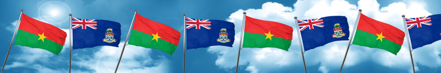 Fototapeta na wymiar Burkina Faso flag with Cayman islands flag, 3D rendering