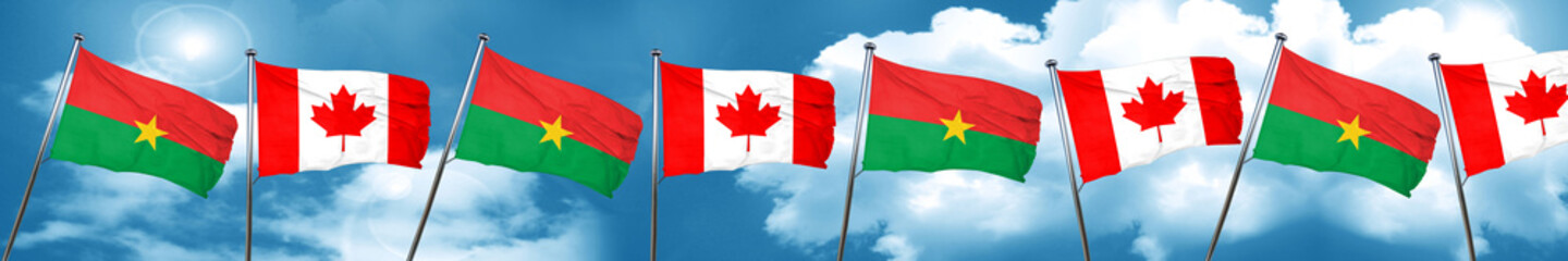 Fototapeta na wymiar Burkina Faso flag with Canada flag, 3D rendering