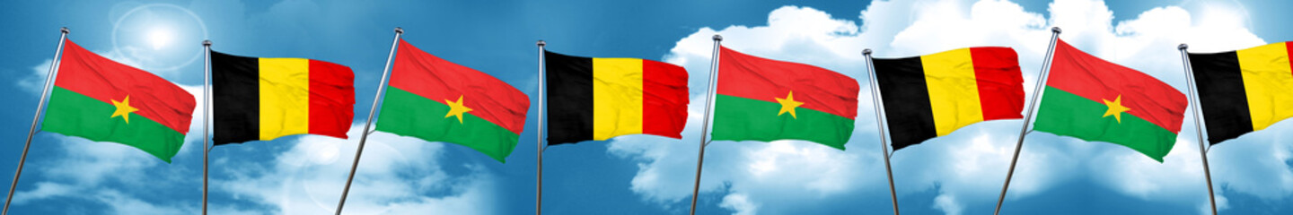 Fototapeta na wymiar Burkina Faso flag with Belgium flag, 3D rendering