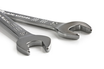 Two open end wrenches isolated on white background. Picture taken in studio with soft-box.