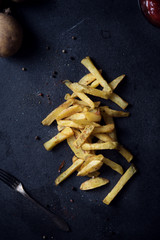 French fries on dark background