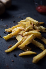 French fries on dark background