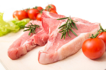 Fresh beef steaks with vegetables