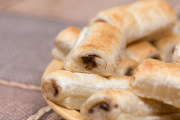 Chocolate cream puff pastry on the baking tray