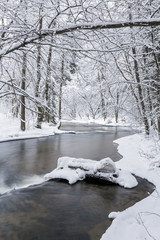 Poland - Roztocze, winter - small waterfalls on the river Tanew