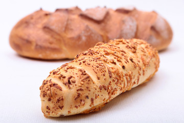 assorted breads isolated on a white background.