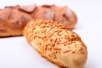 assorted breads isolated on a white background.