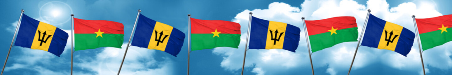 Barbados flag with Burkina Faso flag, 3D rendering