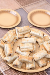 Obraz na płótnie Canvas Chocolate cream puff pastry on the baking tray