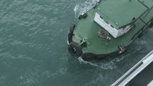 towing the ship from the port