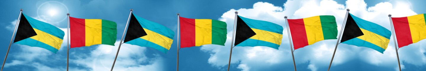 Bahamas flag with Guinea flag, 3D rendering