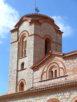 Vertical picture of beautiful tower of Saint Clement Church under vibrant blue sky, Ohrid, Repubic of Macedonia
