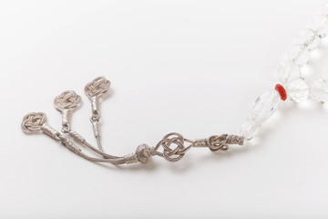 silver accessory of  rosary