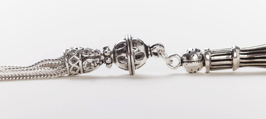silver accessory of  rosary