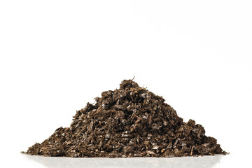 Fertile soil pile isolated on white background.