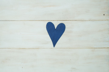 blue heart on a white background, wood painted  Greek blue in vi