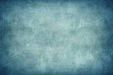 Grungy blue concrete wall texture background.