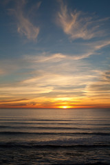 Fototapeta na wymiar Sunset at Manhattan Beach, Half Moon Bay, California