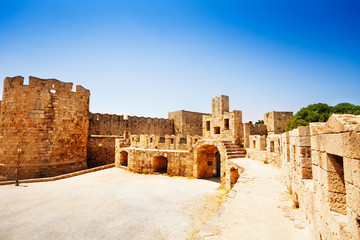 Fototapeta premium Court of Castello Palace fenced in defensive tower