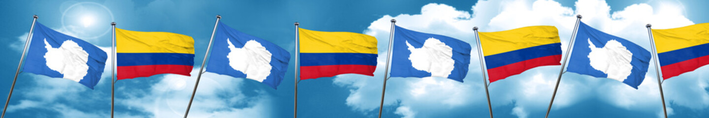 antarctica flag with Colombia flag, 3D rendering