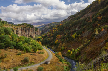 Fototapeta premium View on canyon of Arpa river near spa resort city Jermuk. Autumn's color trees. Armenia