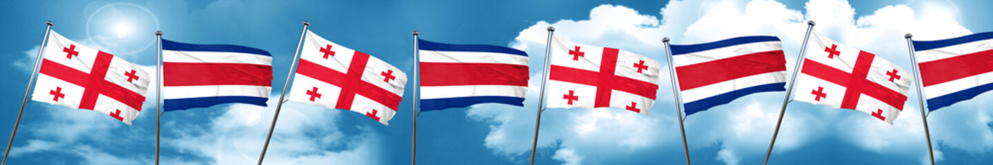 Georgia flag with Costa Rica flag, 3D rendering