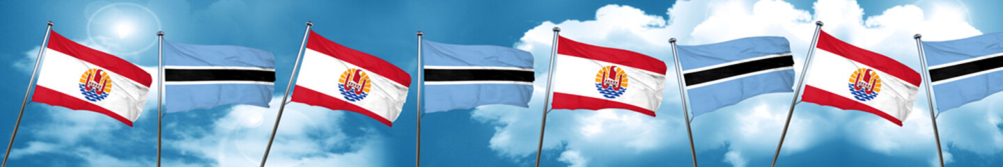 french polynesia flag with Botswana flag, 3D rendering