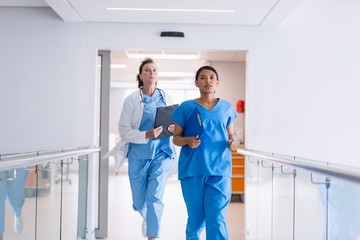 Nurse and doctor running