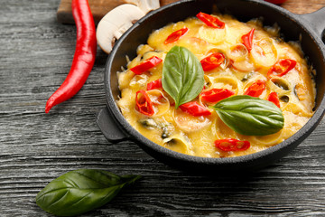 Freshly baked pizza in a pan