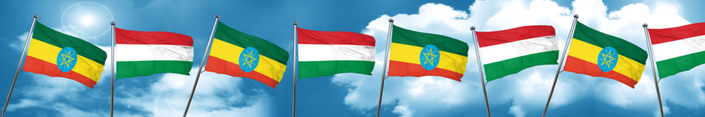 Ethiopia flag with Hungary flag, 3D rendering