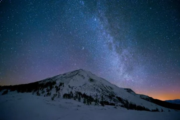 Stoff pro Meter Milky Way over the snowy peaks of the Carpathian Mountains © MIRACLE MOMENTS