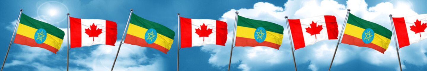 Ethiopia flag with Canada flag, 3D rendering