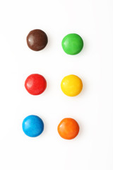 Colorful candies on white background