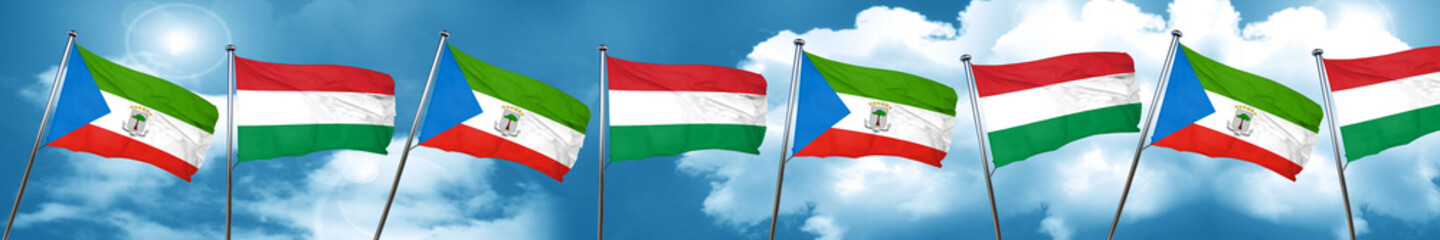 Equatorial guinea flag with Hungary flag, 3D rendering