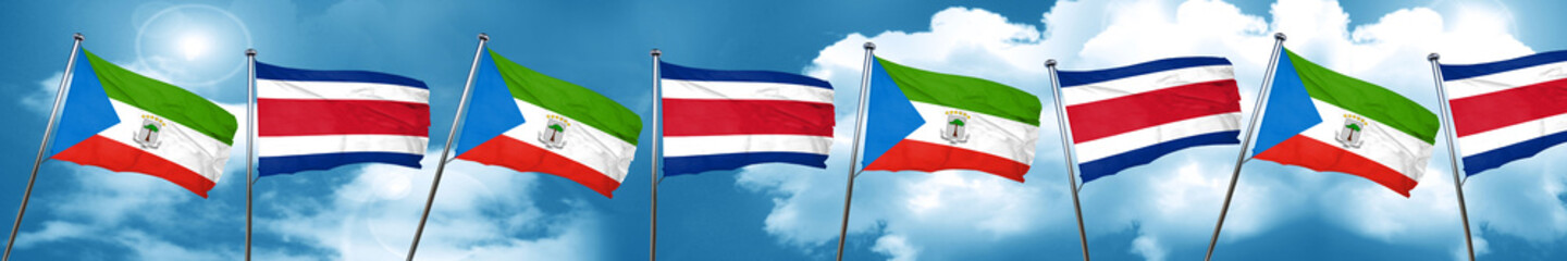 Equatorial guinea flag with Costa Rica flag, 3D rendering